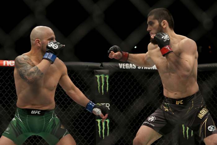 Islam Makhachev and Alexander Volkanovski during their UFC 284 title fight.